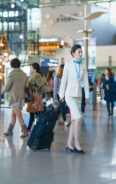 Asian female air flight stewardess in the Incheon international airport