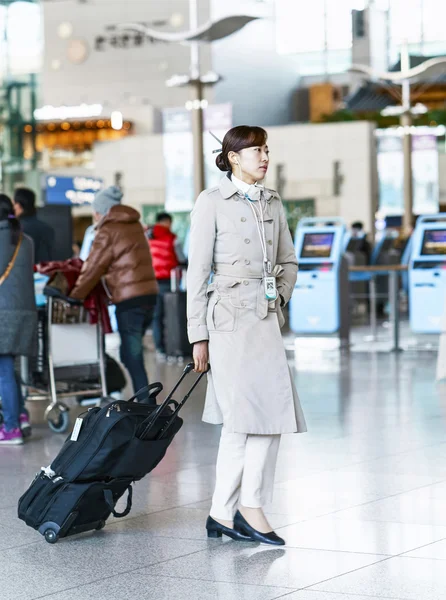 Asian Korean air flight stewardess at the Incheon International airport