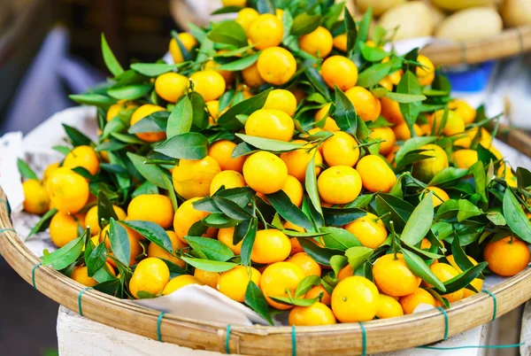 Asian farmer market selling fresh mandarin in Vietnam