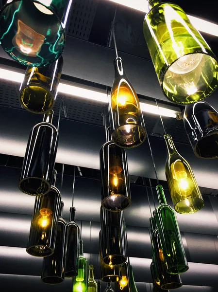 Magnificent retro light lamp decoration made of empty wine bottles