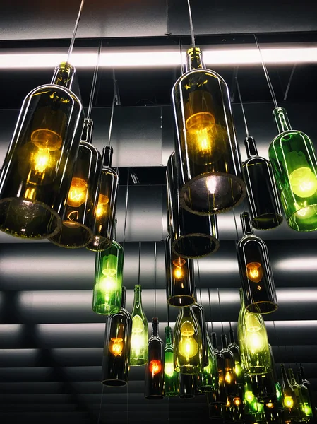 Magnificent retro light lamp decoration made of the wine bottles