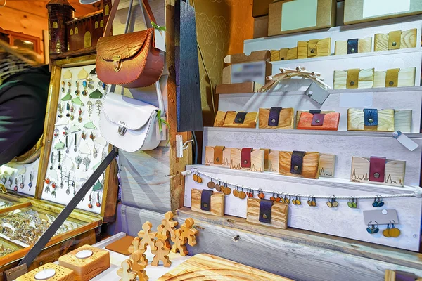 Handmade wooden and leather souvenirs at during Riga Christmas M