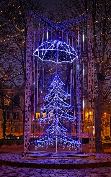 Christmas tree art style in night european city street