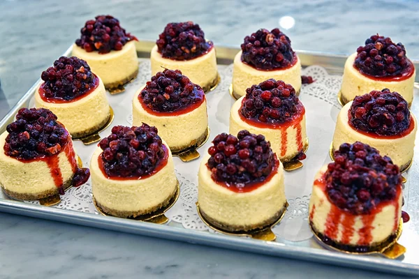 Cheesecake with red berries in the bakery