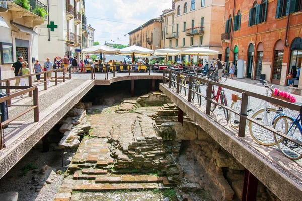 Street in Verona with archaeological site