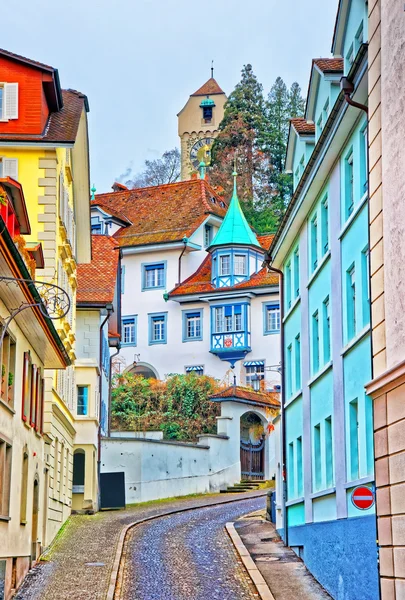 Narrow street with colorful buildings in Lucerne