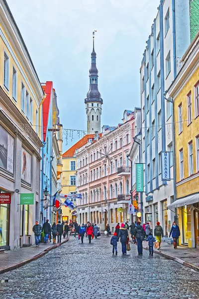 Shopping street with a back view to the Town Hall in the Old city of Tallinn