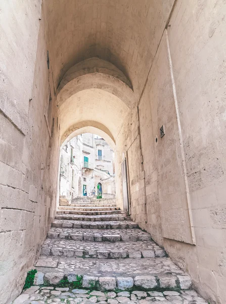 Typical old stairs view of Matera under blue sky