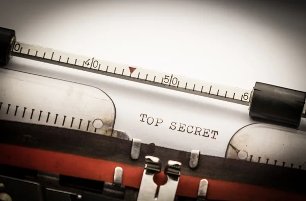 Top secret text on typewriter