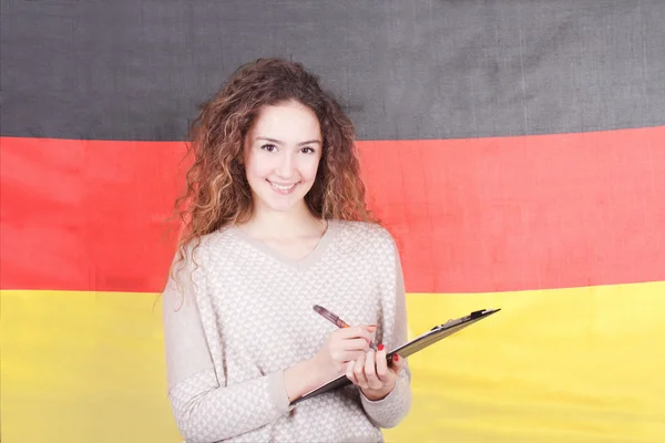 Languages student with flag