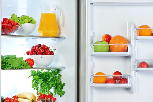 Refrigerator with healthy food fruits and vegetables