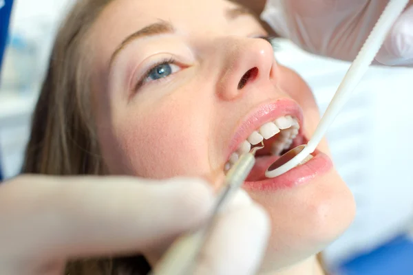 Open mouthed woman at the dentist