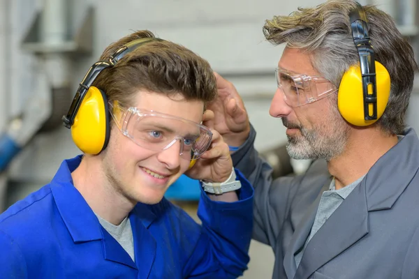 Boy with ear protection