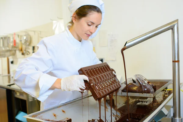 Chocolate maker at work