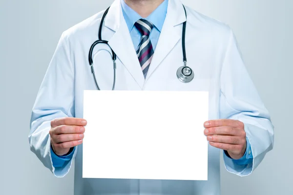 Doctor with a blank white banner