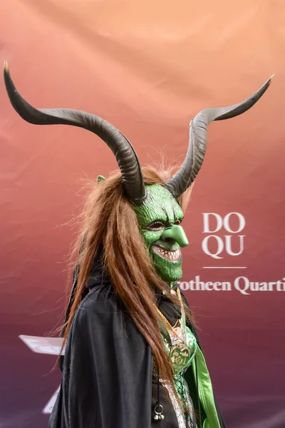 Green devil at Carnival parade, Stuttgart