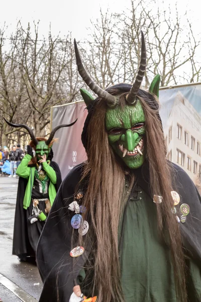 Green devils at Carnival parade, Stuttgart