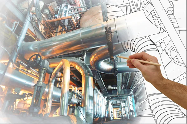 Man's hand draws a design of factory combined with photo of mode