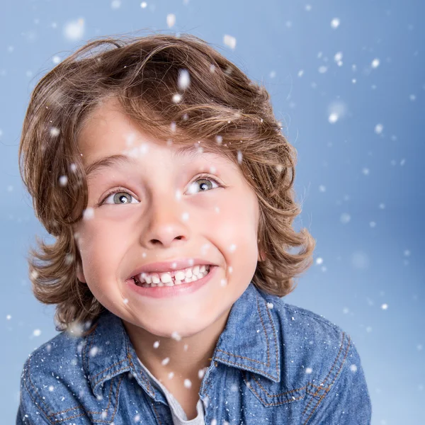 Child looking snow