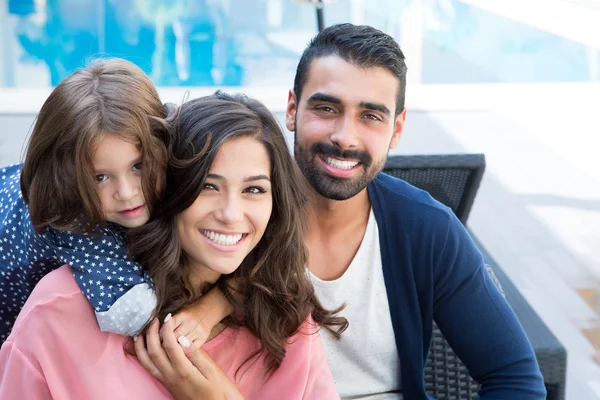 Family close to the pool