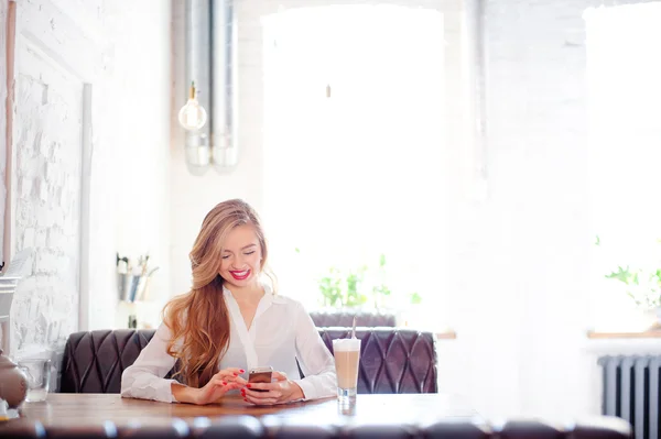 Woman using smartphone.