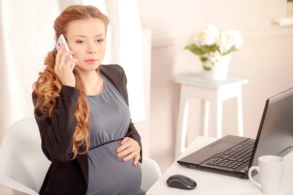 Pregnant lady at work