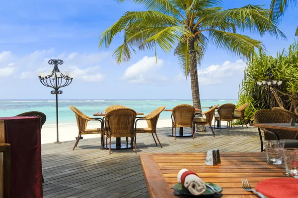 Tropical restaurant by the ocean