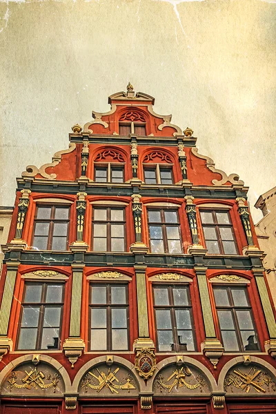 Old postcard with architectural facade detail at one old buildin