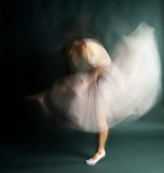 Ballet dancer woman in motion blur, ballerina