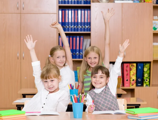 Children raising hands