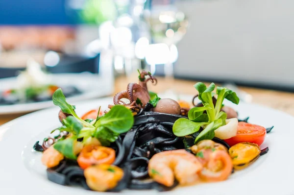 Seafood Lunch. Black Spaghetti Pasta with Sea Food