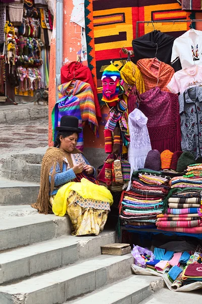 Woman at Souvenir and Handicraft Stand in La Paz, Bolivia