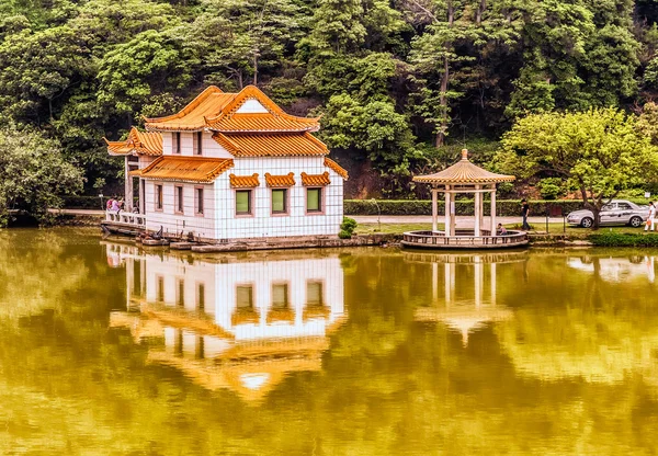 House at the river in China