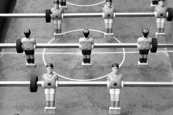 Black and white photo of old table football