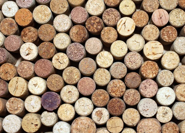 Background of used wine corks, wall of many different wine corks closeup