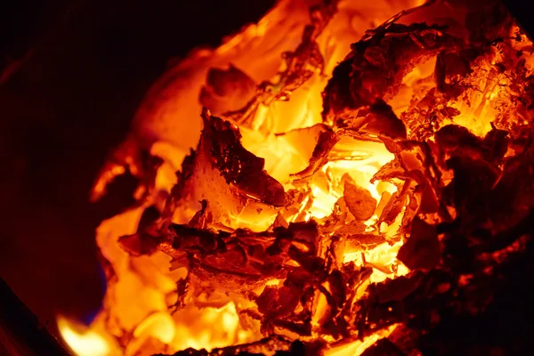 The heated coals in the furnace.