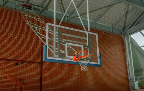 Basketball equipment on an indoor court