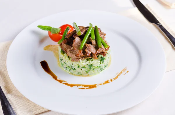 Tasty Beef Meat and Beans on Risotto Dish