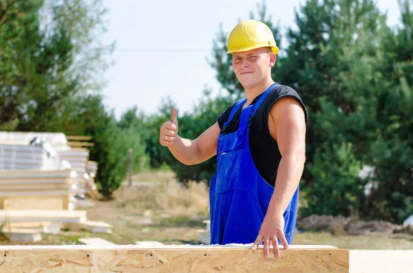 Builder giving a thumbs up gesture