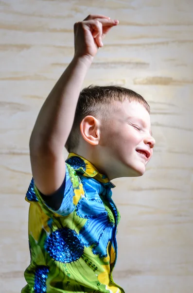 Young Boy Dancing and Snapping Fingers