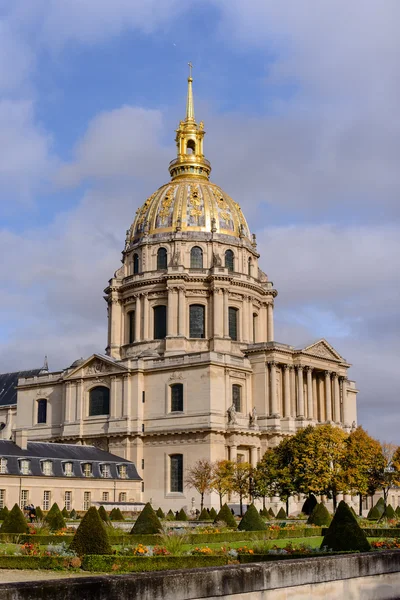 Golden dome of Les Invalides on background. Les Invalides - complex of museums and monuments, burial site for some of France\'s war heroes, notably Napoleon Bonaparte.