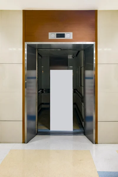 Open door with blank sign in side the out of order elevator