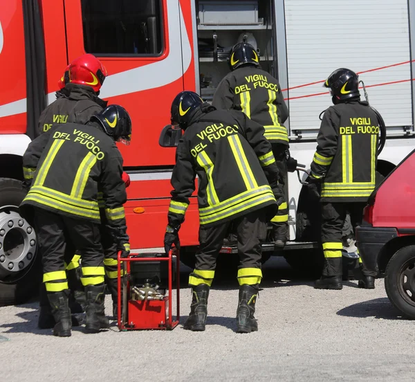 Group of firefighters working as a perfect teamwork