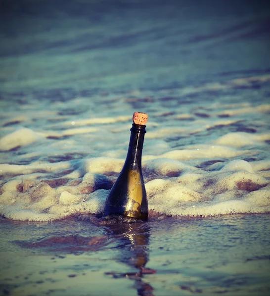 Bottle in the ocean with a secret message 4