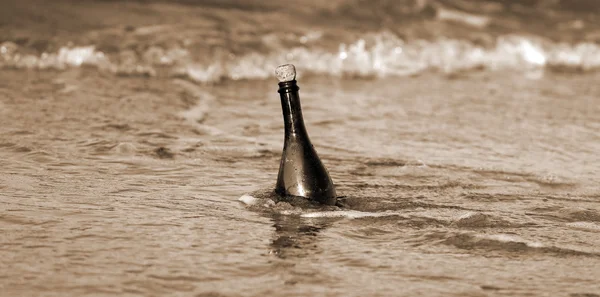 Bottle in the ocean with a secret message