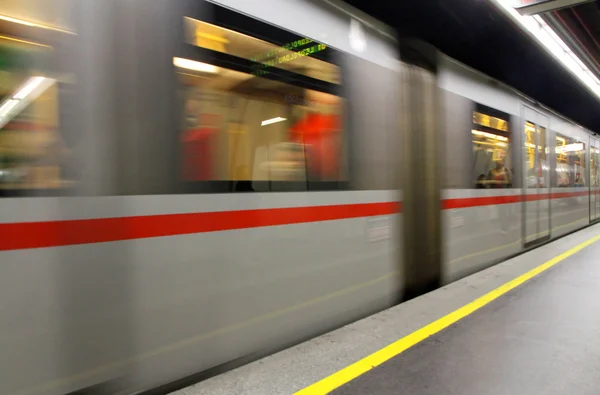Fast underground subway train while hurtling fast