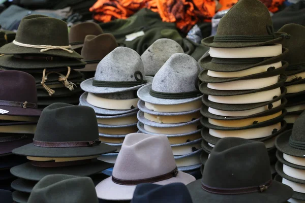 Felt hats of all sizes for sale at flea market