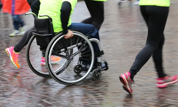 Disabled athlete with the wheelchair during a sports competition