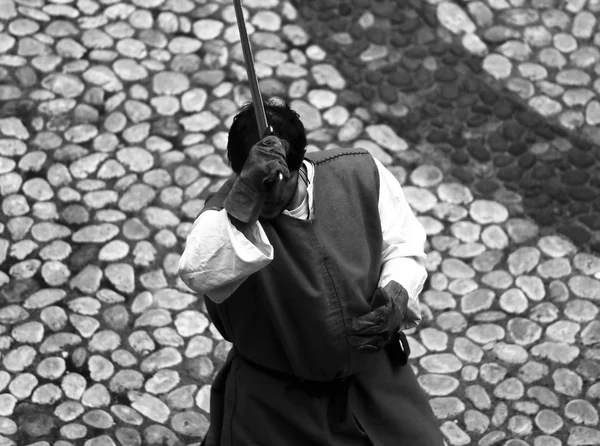 Medieval soldier with sword during the final duel