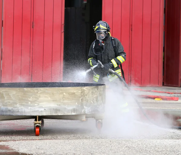 Firefighter with breathing apparatus and oxygen bottles